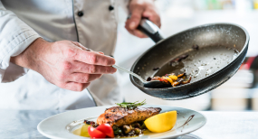 chef cooking in a pan